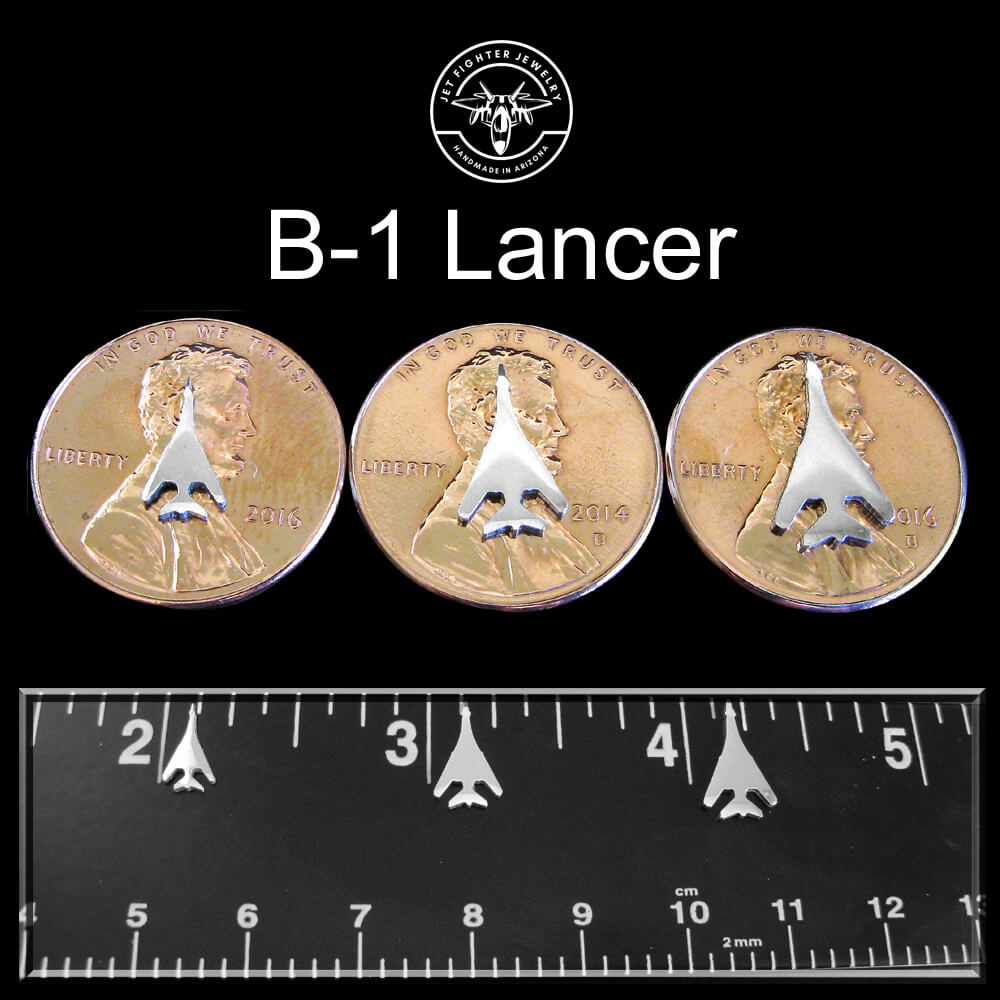 Jet Fighter Jewelry Size chart for B-1 Lancer stud earrings showing 3 different sizes on pennies and a ruler