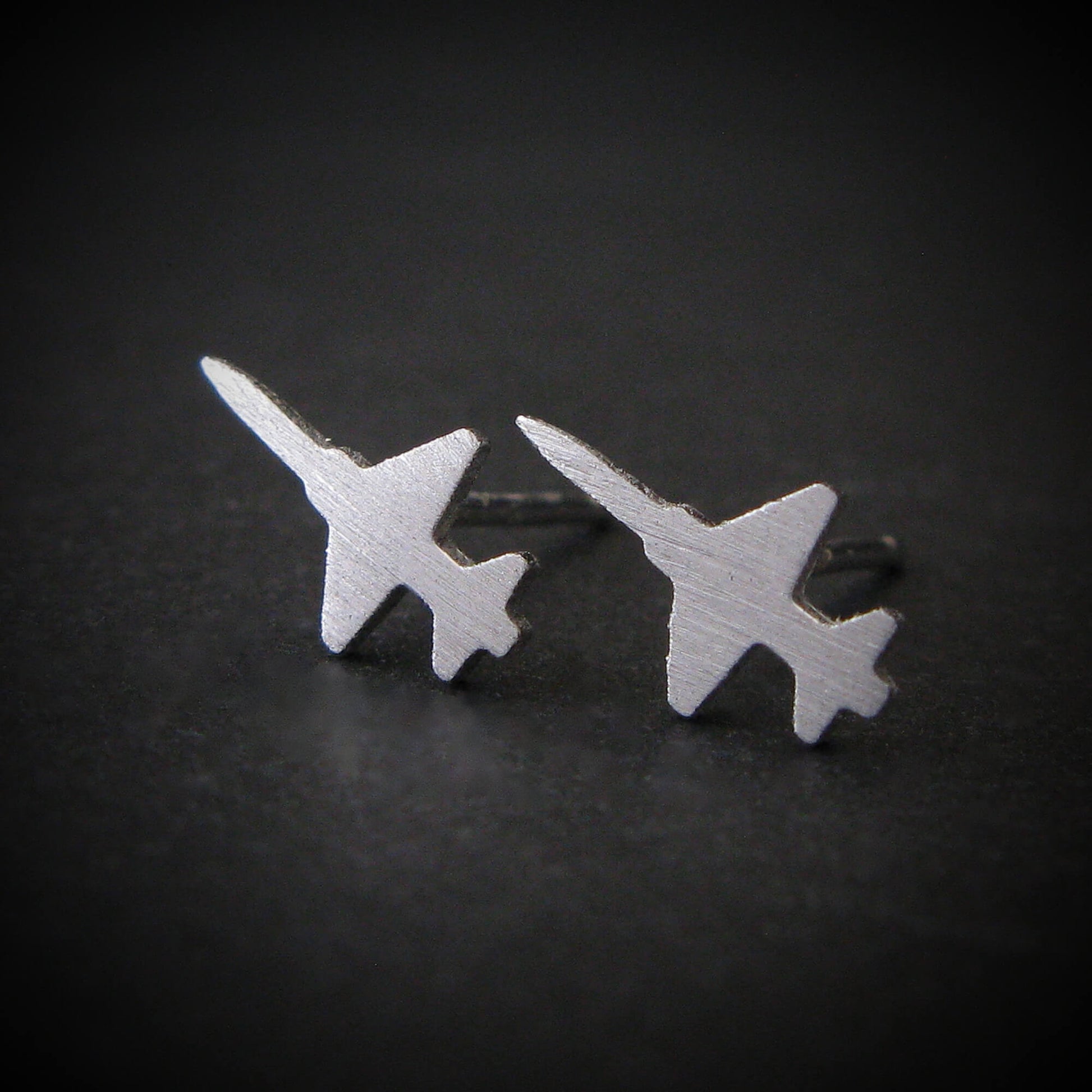 Matte brushed sterling silver T-38 Talon earrings – jet-shaped minimalist studs