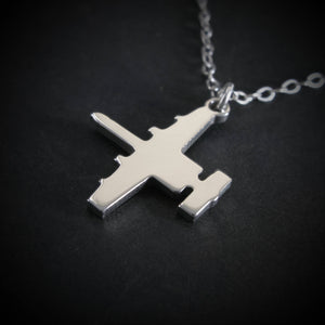 Close-up sterling silver A-10 Warthog aircraft pendant necklace aviation jewelry
