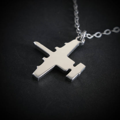 Close-up sterling silver A-10 Warthog aircraft pendant necklace aviation jewelry