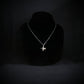 A-10 Thuderbolt military jet pendant necklace handmade in sterling silver on display bust