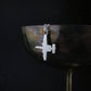 Sterling silver A-10 Warthog military aircraft pendant necklace draped on wine goblet aviation jewelry
