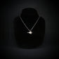 B-1 Lancer bomber jet pendant necklace handmade in sterling silver on display bust, military aviation jewelry