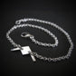 Close-up of sterling silver B-21 Raider bomber bracelet on dark background