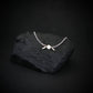 B-21 Raider sterling silver bracelet on black stone display
