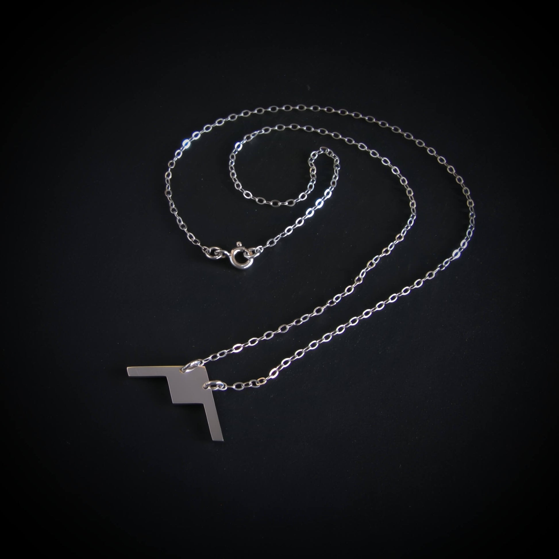 Handcrafted sterling silver B-21 Raider bomber jet necklace with delicate chain