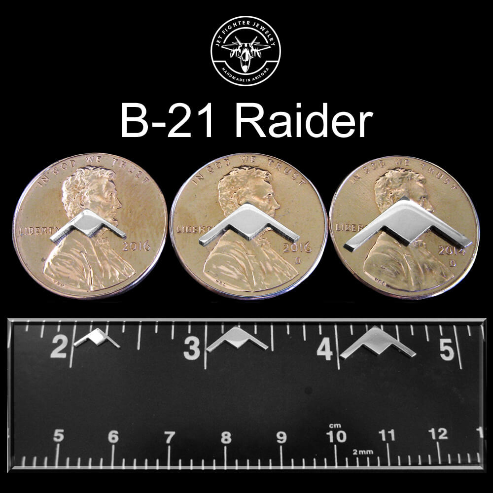 B-21 Raider jewelry size chart for 3 different sizes of stud earrings shown on a ruler and pennies Jet Fighter Jewelry