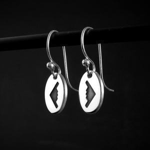 Sterling silver B‑2 Spirit bomber airplane dangle earrings on black background – handmade military aviation jewelry