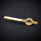 14k gold B-2 Spirit Bomber tie bar featuring engraved stealth jet silhouette on dark background