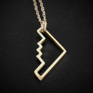 14k Gold B‑2 Spirit bomber airplane outline pendant necklace with chain – handmade aviation jewelry on dark background