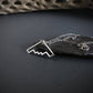 Sterling silver B‑2 Spirit bomber airplane outline pendant necklace on chain – handmade aviation jewelry displayed on slate background