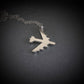 Silver B-52 Bomber Stratofortress Military Jet pendant on a dark background
