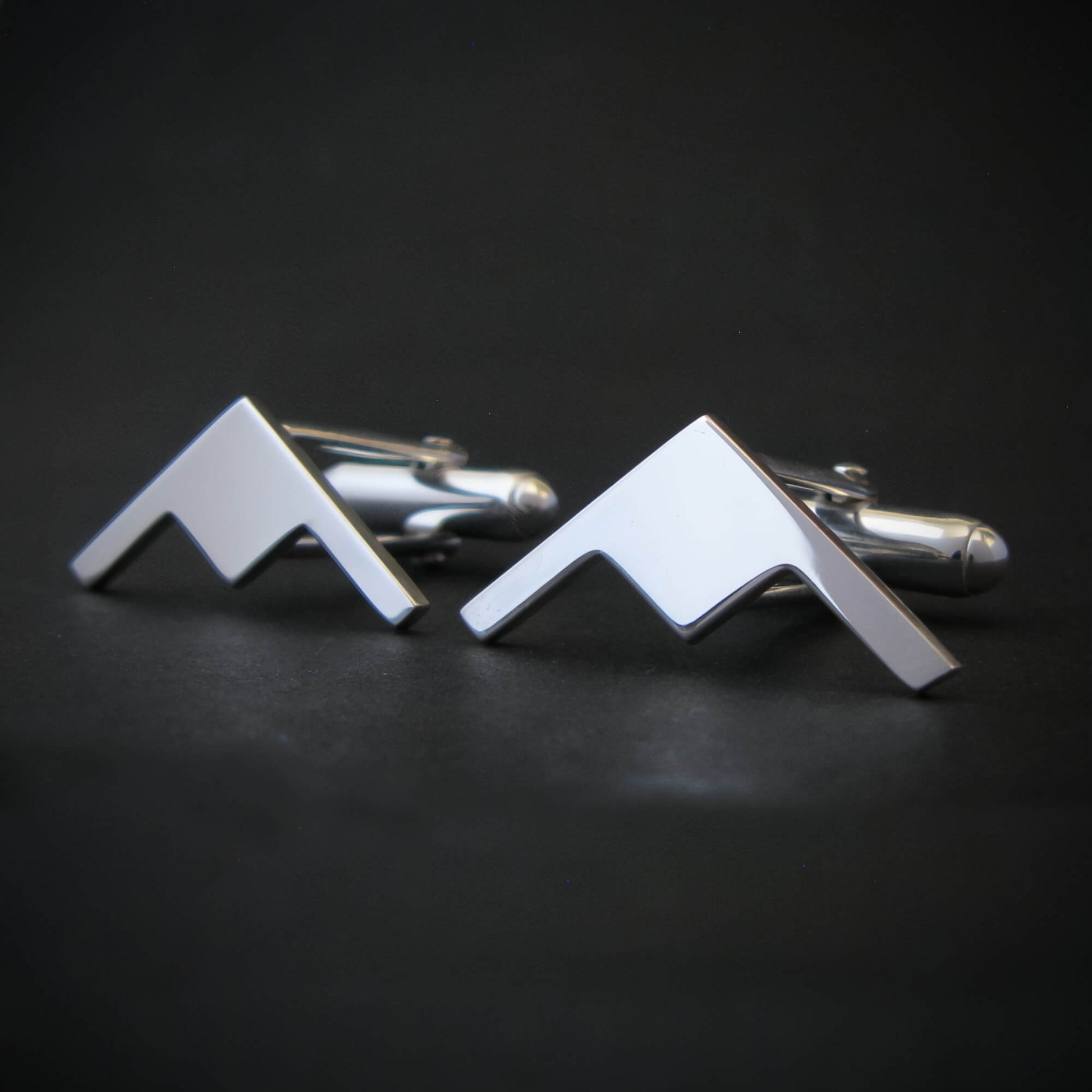 Polished B-21 Raider stealth bomber airplane cuff links in sterling silver