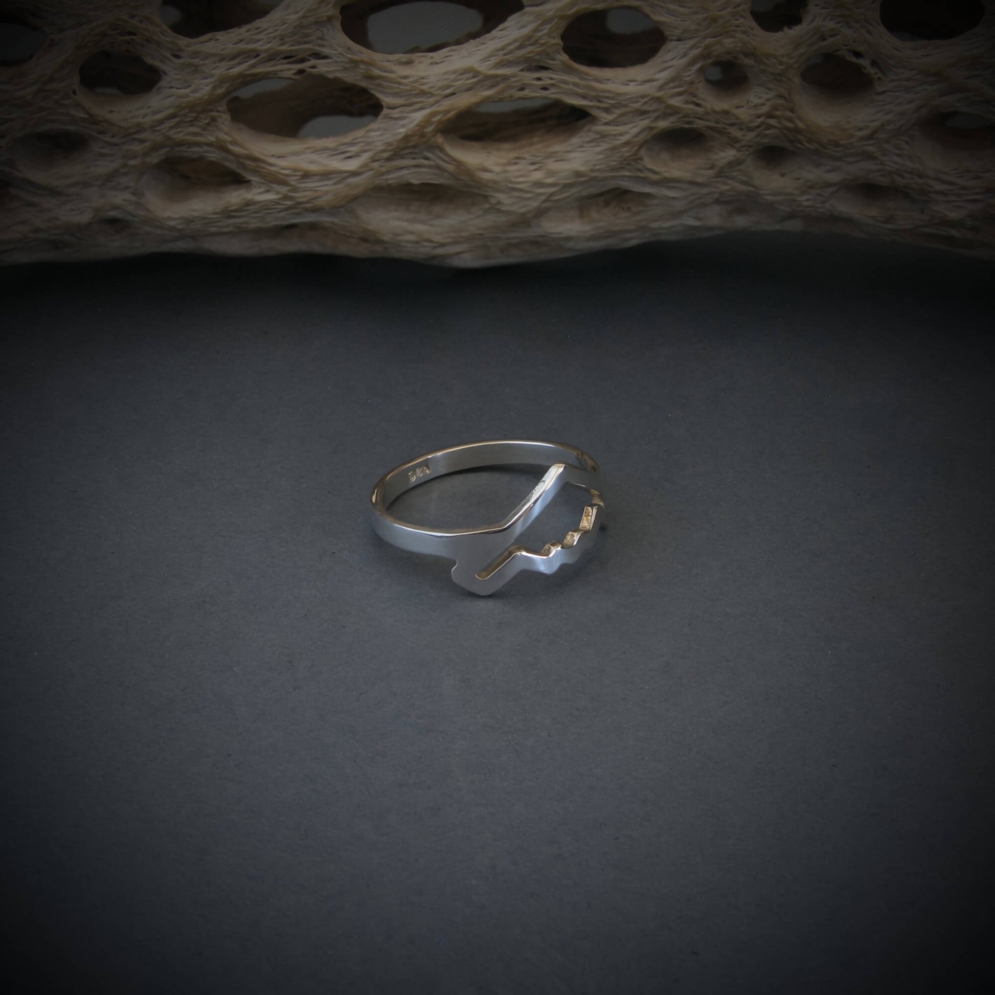 B-2 Spirit Bomber Jet Silver Ring Military Jewelry on a dark background