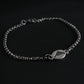 Antiqued Silver B-2 Spirit Bomber Military Jewelry bracelet with a clasp on a black background