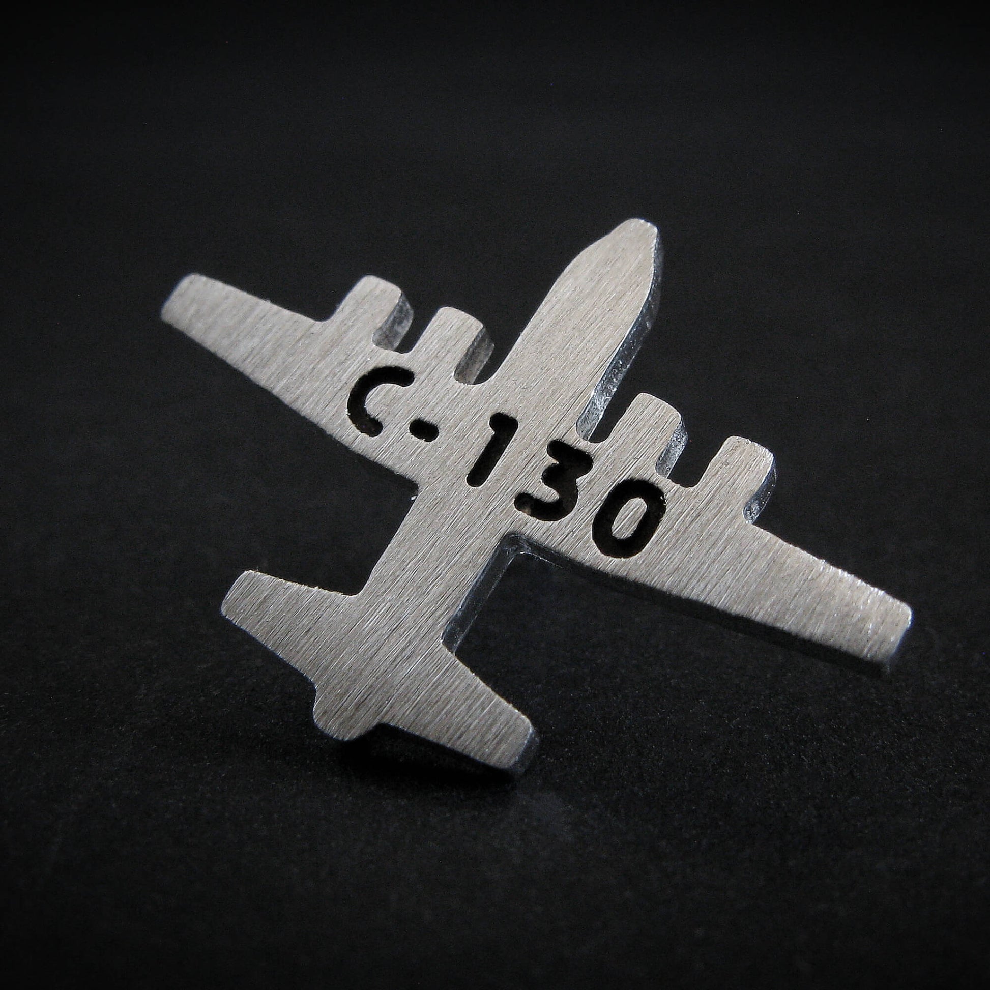 Handcrafted C-130 Hercules airplane tie tack in brushed sterling silver – military aviation jewelry