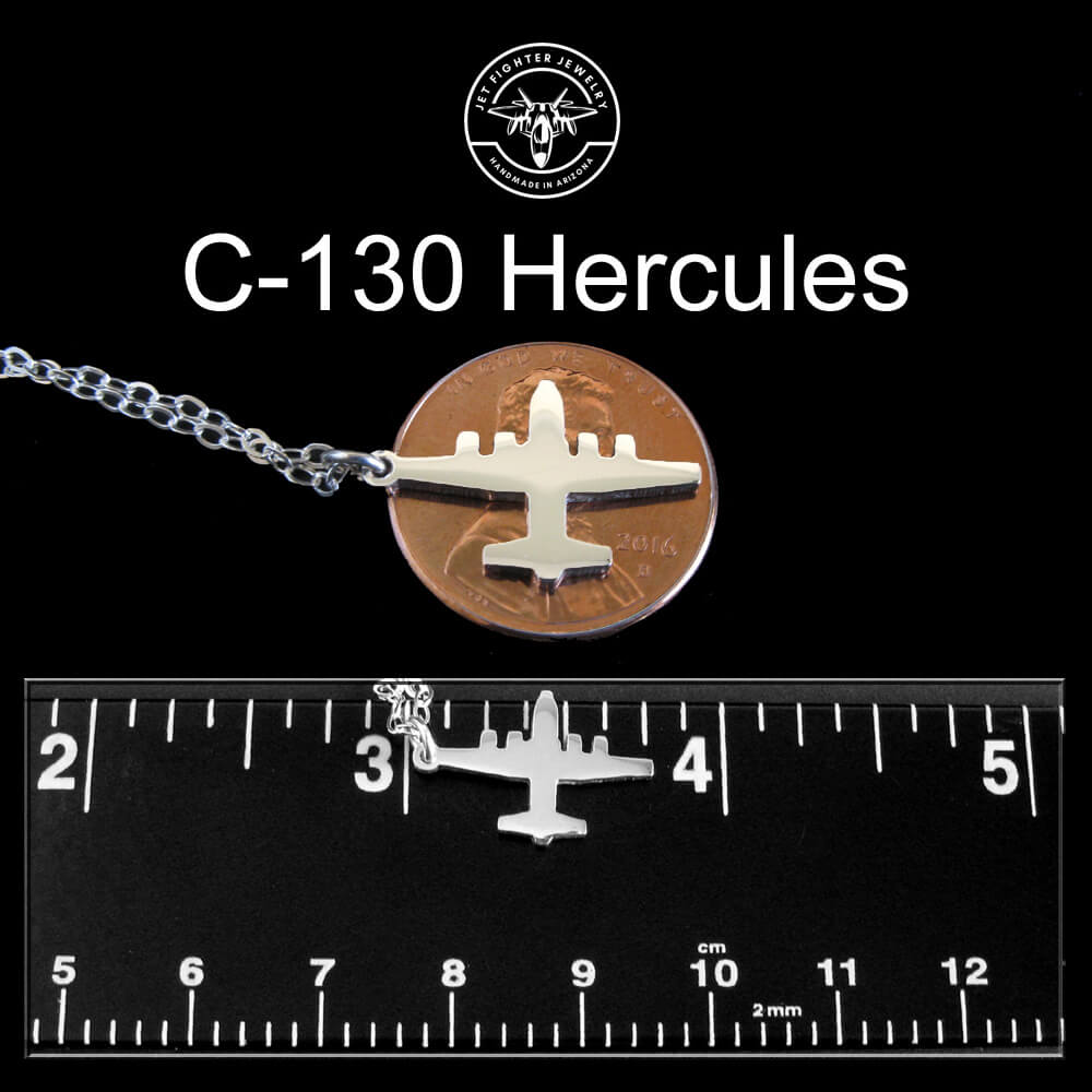 C-130 Hercules Military Aircraft sterling silver pendant necklace shown on a ruler and penny for size reference