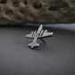 Antiqued sterling silver C-130 Hercules airplane tie tack with engraved text on gray background – handcrafted aviation jewelry