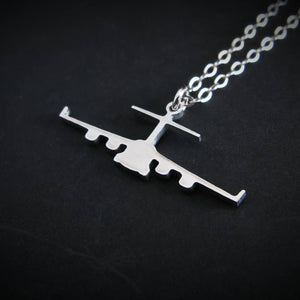 Zoomed view of sterling silver C-17 front profile necklace with fine polish and matching chain