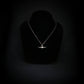 C-17 military aircraft necklace hanging on a bust, showing sterling silver silhouette and dainty matching chain