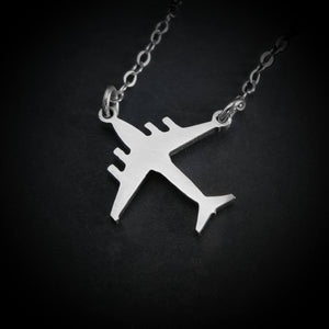 Close-up of C-17 Globemaster silhouette necklace in sterling silver