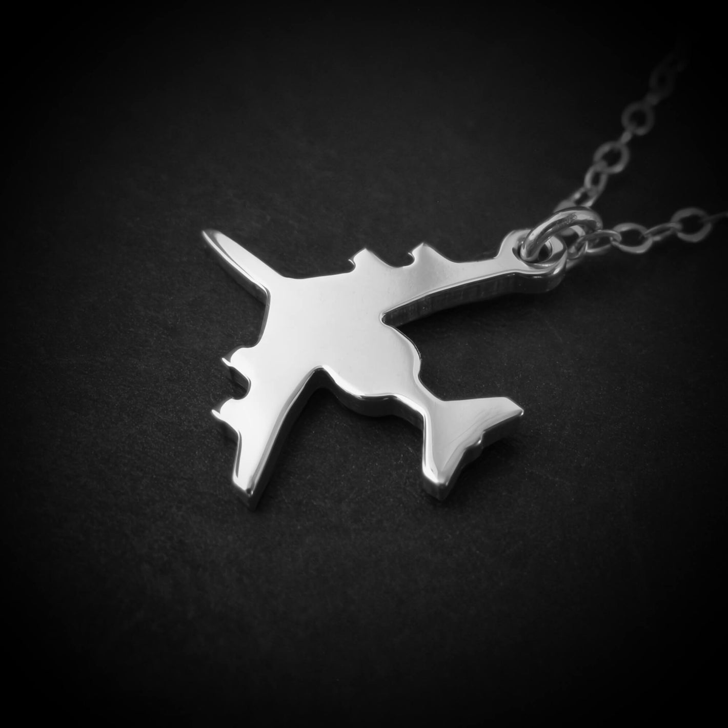Close-up sterling silver E-3 Sentry AWACS pendant necklace aviation military jewelry