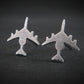 Antiqued Sterling Silver E-3 Sentry military jet airplane shaped stud earrings on a black background