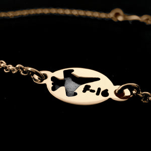 Gold F-16 Military jet bracelet with an 'F-16' engraving on a black 