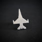 Silver Engraved F-16 military fighter jet airplane tie tack on a black background