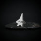 Silver F-22 fighter jet engraved tie pin on a dark background