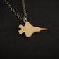 14k Gold F-35 Military Fighter Jet pendant on a chain against a black background