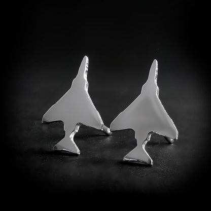 Polished Sterling Silver F-4 Phantom Military Jet airplane shaped earrings on a black background