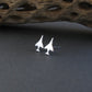 Antiqued Sterling Silver F-4 Phantom Military Jet airplane shaped earrings on a natural background
