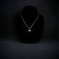 Sterling silver F-5 Freedom Fighter jet pendant necklace displayed on black bust, handmade aviation jewelry
