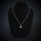 Sterling silver F-14 Tomcat fighter jet pendant necklace on black bust display, handmade Navy aviation jewelry