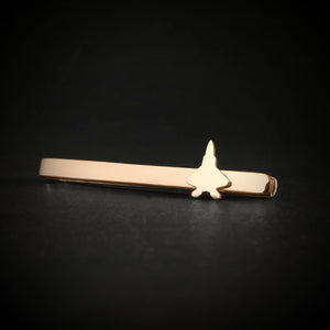 Gold F-22 Raptor Military jet tie bar on black background, handmade aviation jewelry