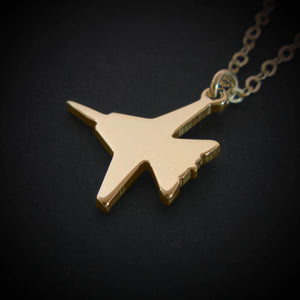Close-up of handcrafted 14k gold F-14 Tomcat jet fighter pendant necklace, aviation jewelry made in USA