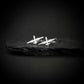 MQ-9 Reaper drone cufflinks in polished sterling silver displayed on black slate rock