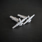 Angled view of MQ-9 Reaper cufflinks in satin sterling silver finish with bullet-back closures