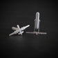 Satin sterling silver MQ-9 Reaper drone cufflinks shown from rear and side angles on black surface