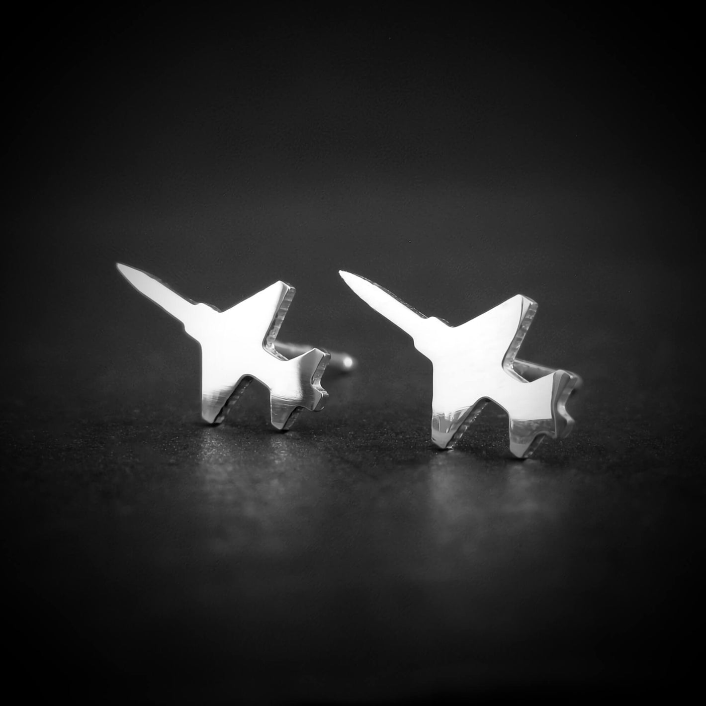 Shiny sterling silver T-38 Talon jet earrings – sleek military aviation-inspired studs