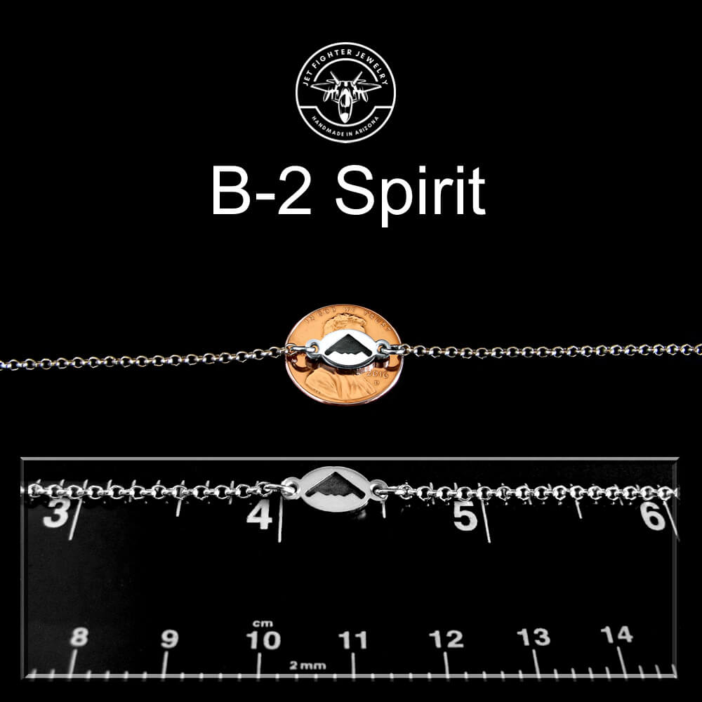 B-2 Military Bomber Jet Bracelet with a circular design on a black background with measurement scale