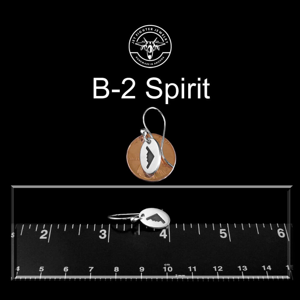 Sterling silver B-2 Spirit bomber airplane dangle earrings with penny and ruler for size reference – handmade aviation jewelry