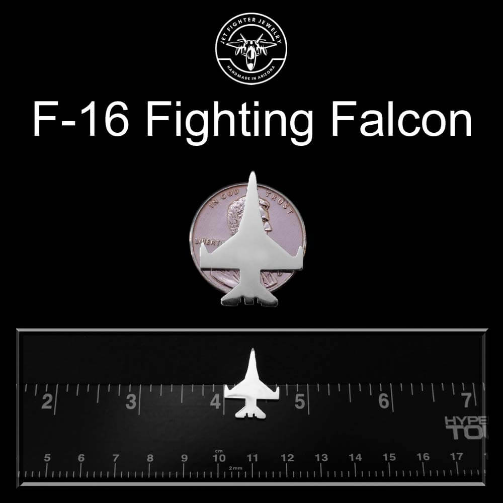 sterling silver F-16 tie tack on a penny and ruler for size reference