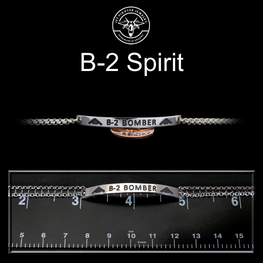 B-2 Spirit bracelet with chain length measurement on a black background