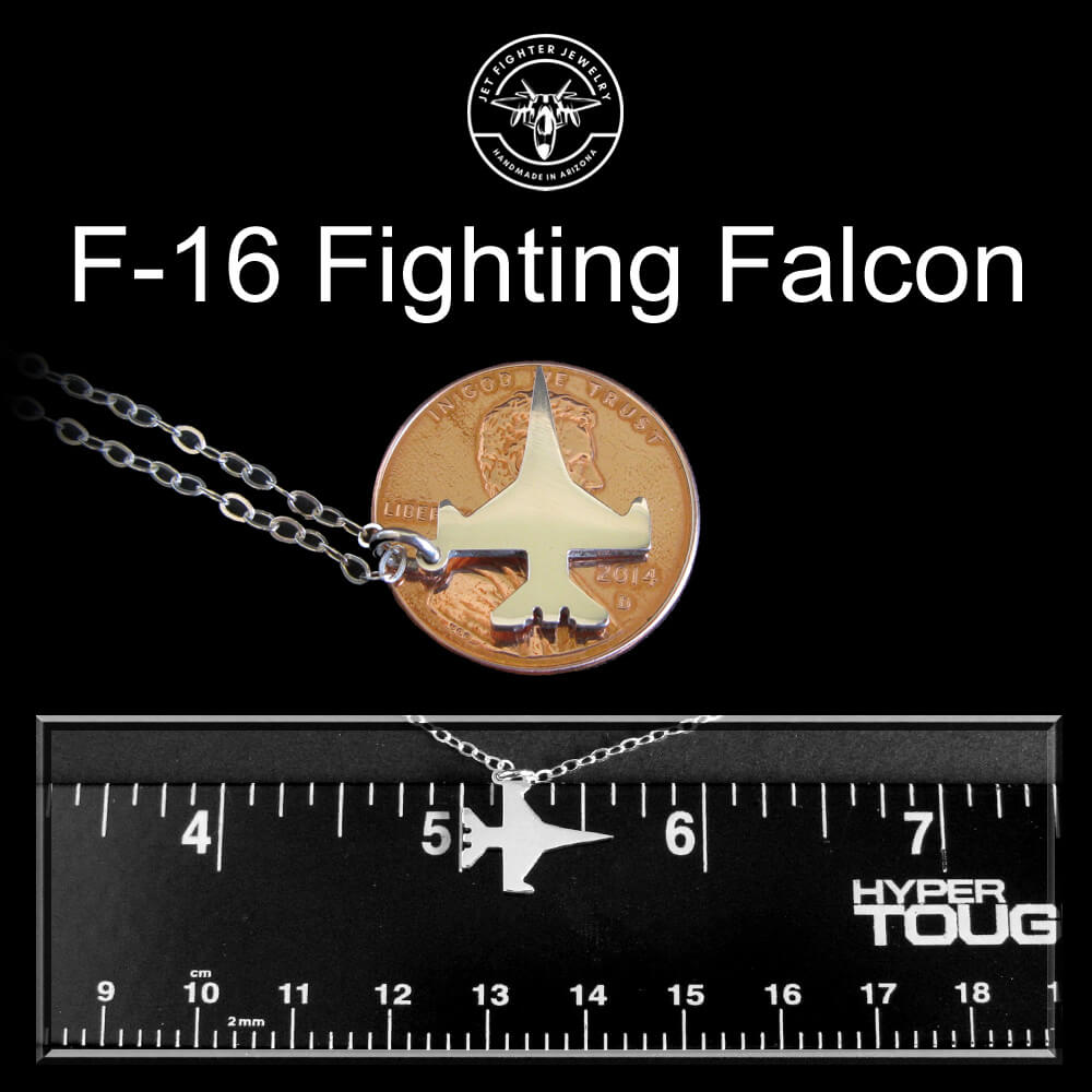 F-16 Fighting Falcon jet pendant necklace size comparison – handmade sterling silver military aviation jewelry shown with penny and ruler for scale