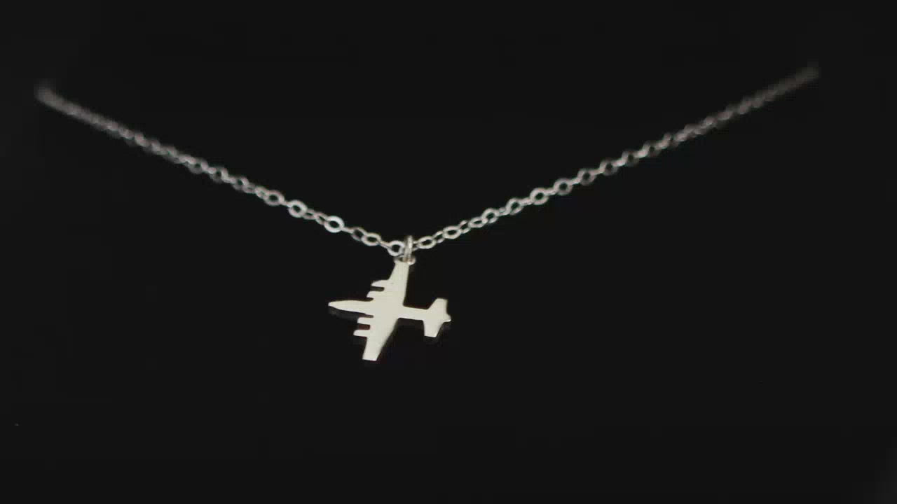 Image of a Sterling Silver C-130 Airplane Pendant going back and forth on a turntable