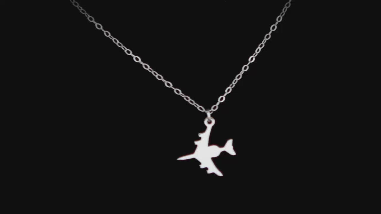 Load video: Image of a Sterling Silver C-130 Airplane Pendant going back and forth on a turntable