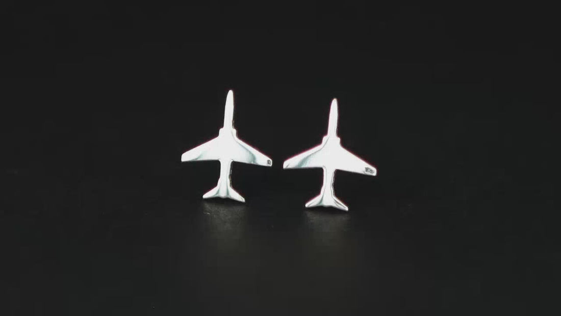 video of T-45 Goshawk stud earrings made from sterling silver on a black background 