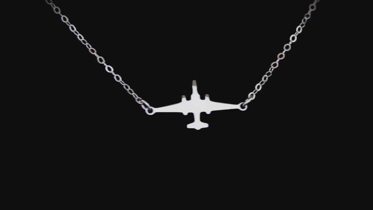 Sterling silver U-2 necklace mid chain on a bust with a black background